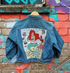 Send in your denim jacket + we'll sew on this panel!