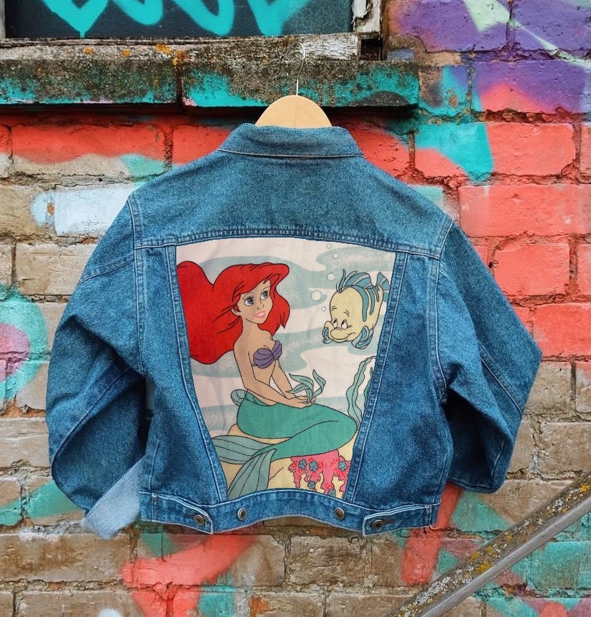 Send in your denim jacket + we'll sew on this panel!