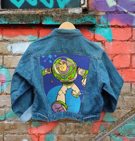 Send in your denim jacket + we'll sew on this panel!